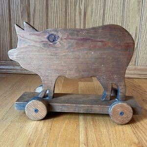 Wood pig on wheels